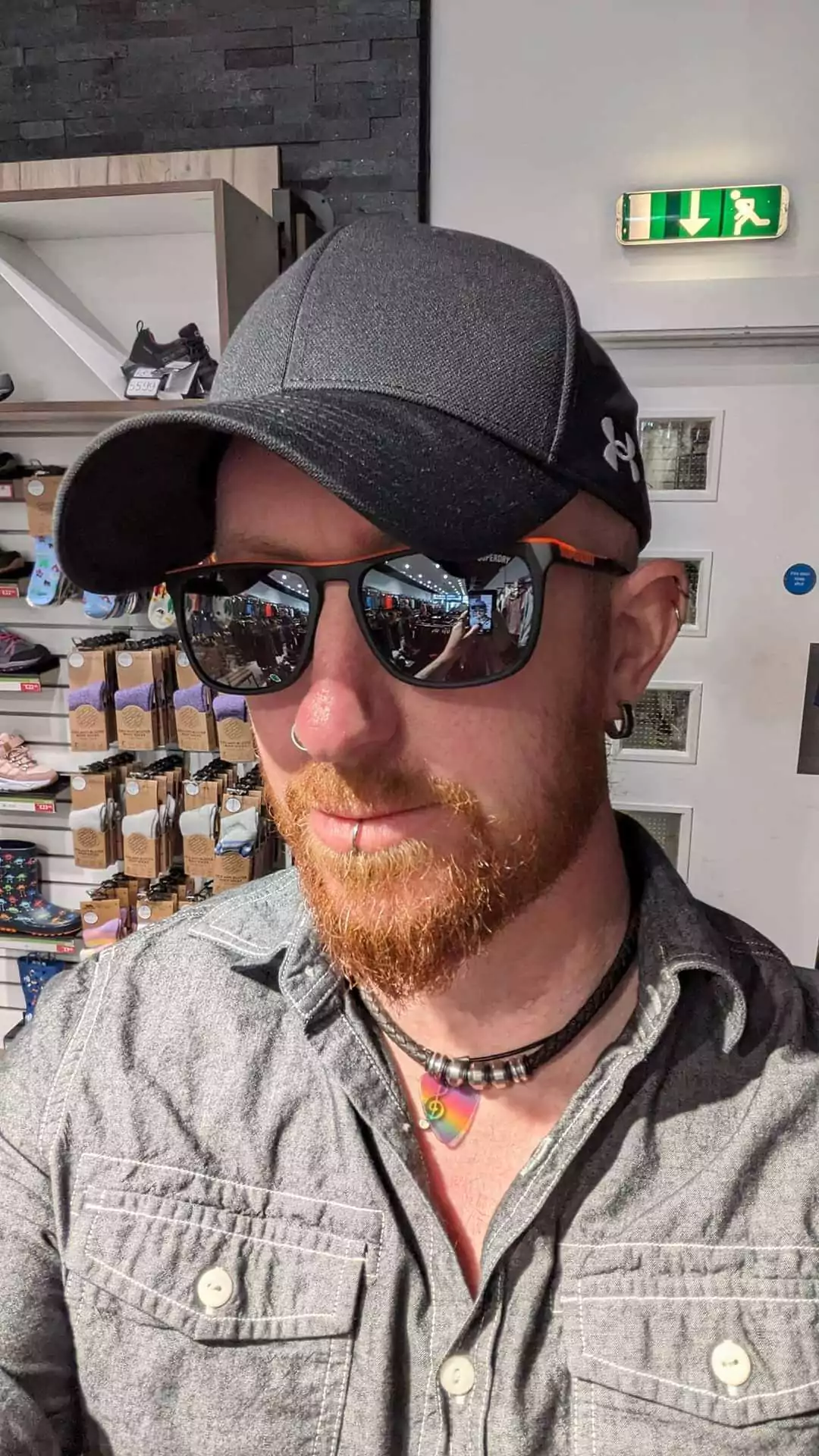 Male online learner wearing sunglasses and cap